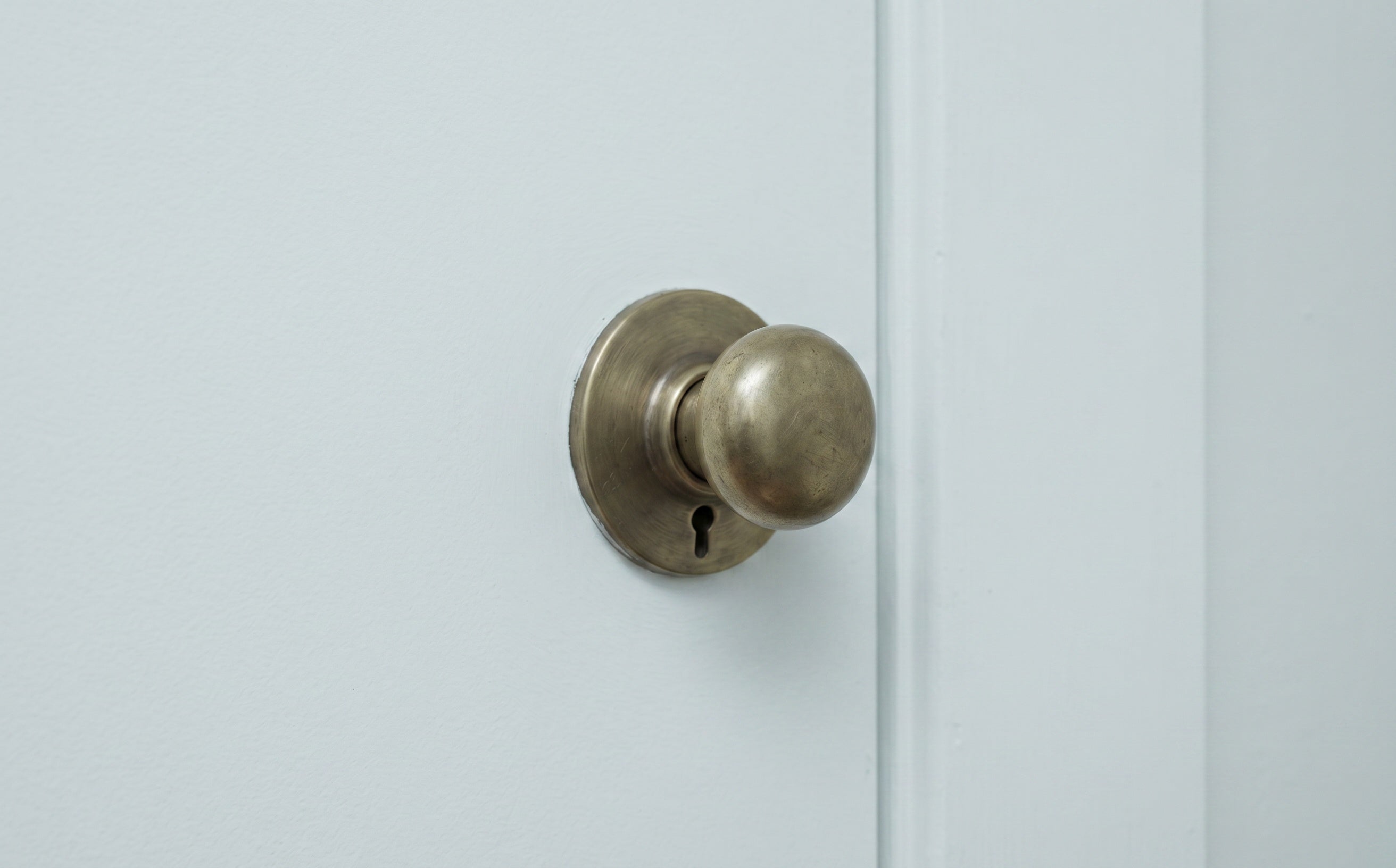 Plain brass doorknob without cover